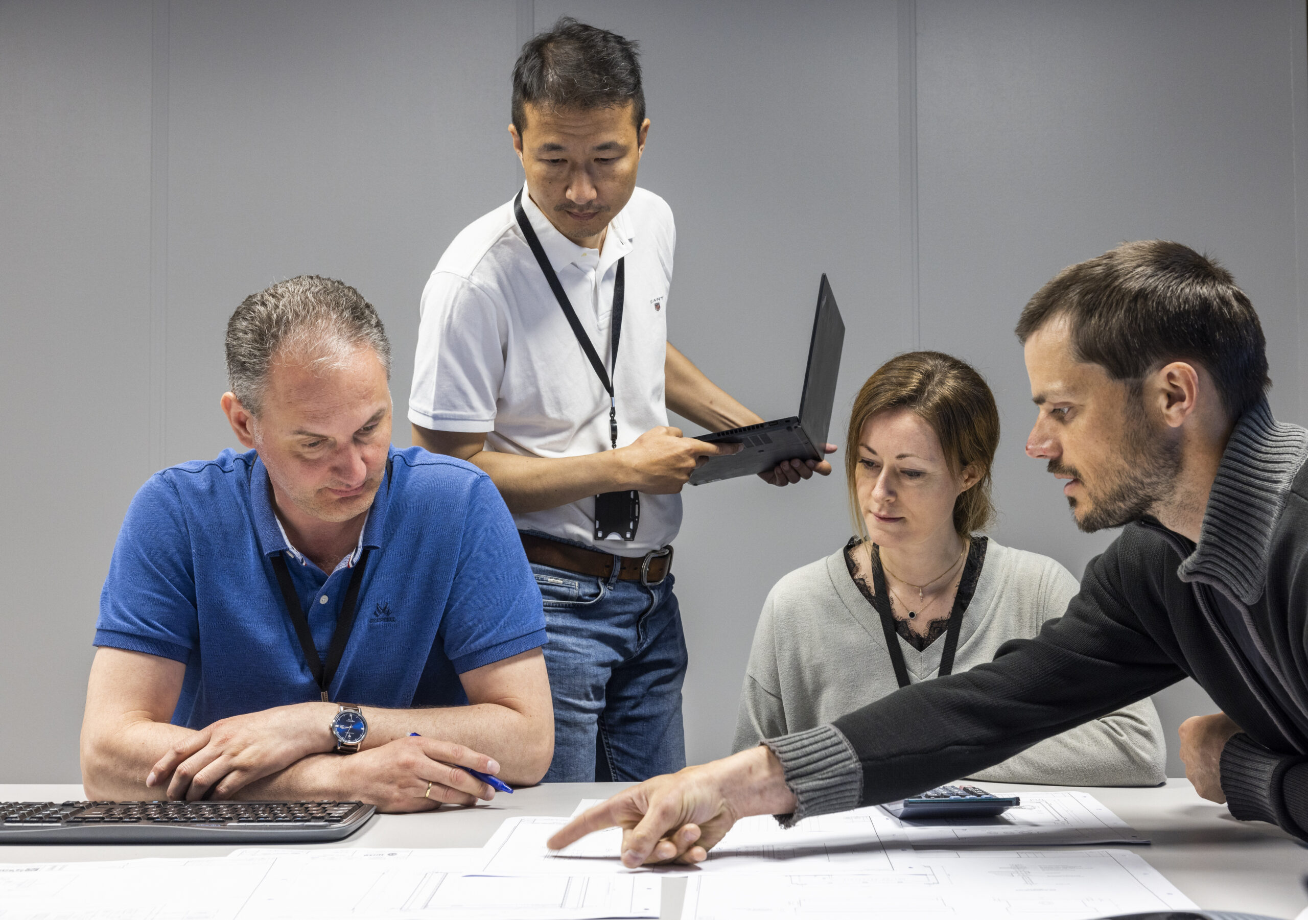 The WISE Group team reviewing drawings together